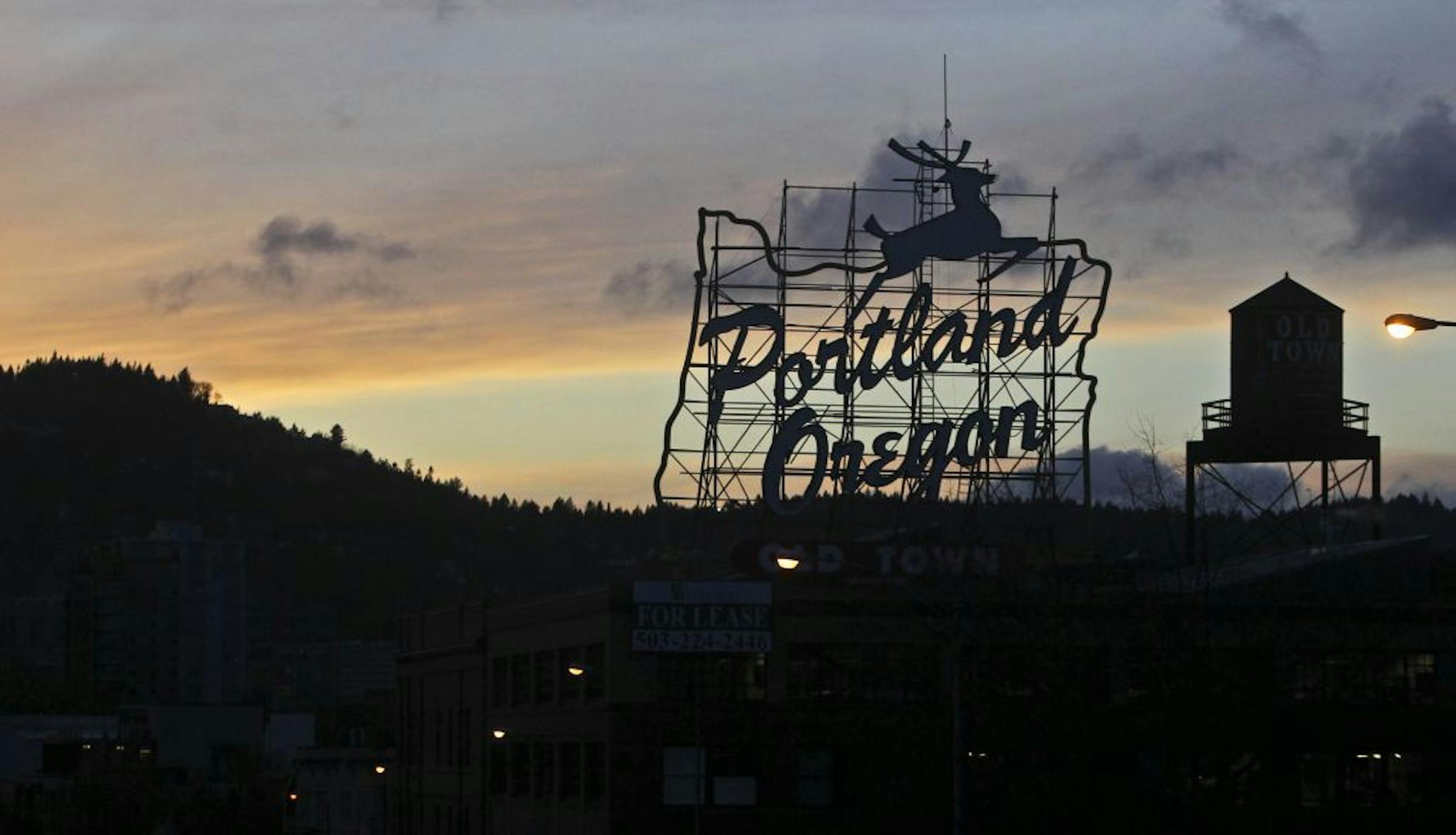 The prominent "Portland Oregon" sign with the leaping stag is a designated city landmark, but its words have changed several times since the 1940s.