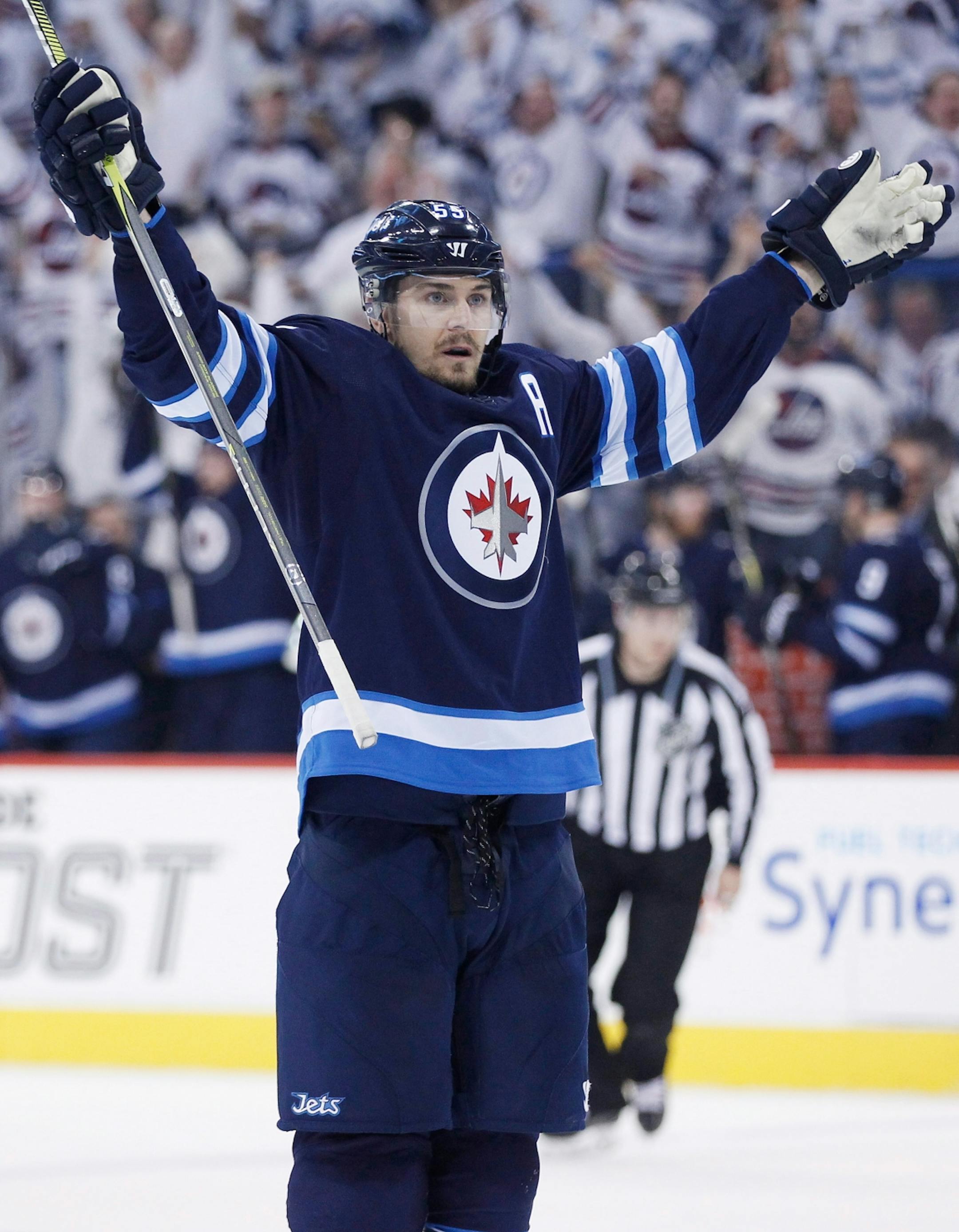 Winnipeg Jets' Mark Scheifele celebrates his goal against the Minnesota Wild during the second period of Game 1 in an NHL hockey first-round playoff series Wednesday, April 11, 2018, in Winnipeg, Manitoba.