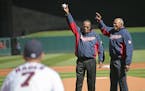 Hall of Famer Rod Carew and Twins Hall of Famer Tony Oliva greeted the crowd before Carew threw out the first pitch at Target Field before the Twins t