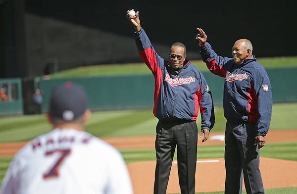 Hall of Famer Rod Carew and Twins Hall of Famer Tony Oliva greeted the crowd before Carew threw out the first pitch at Target Field before the Twins t