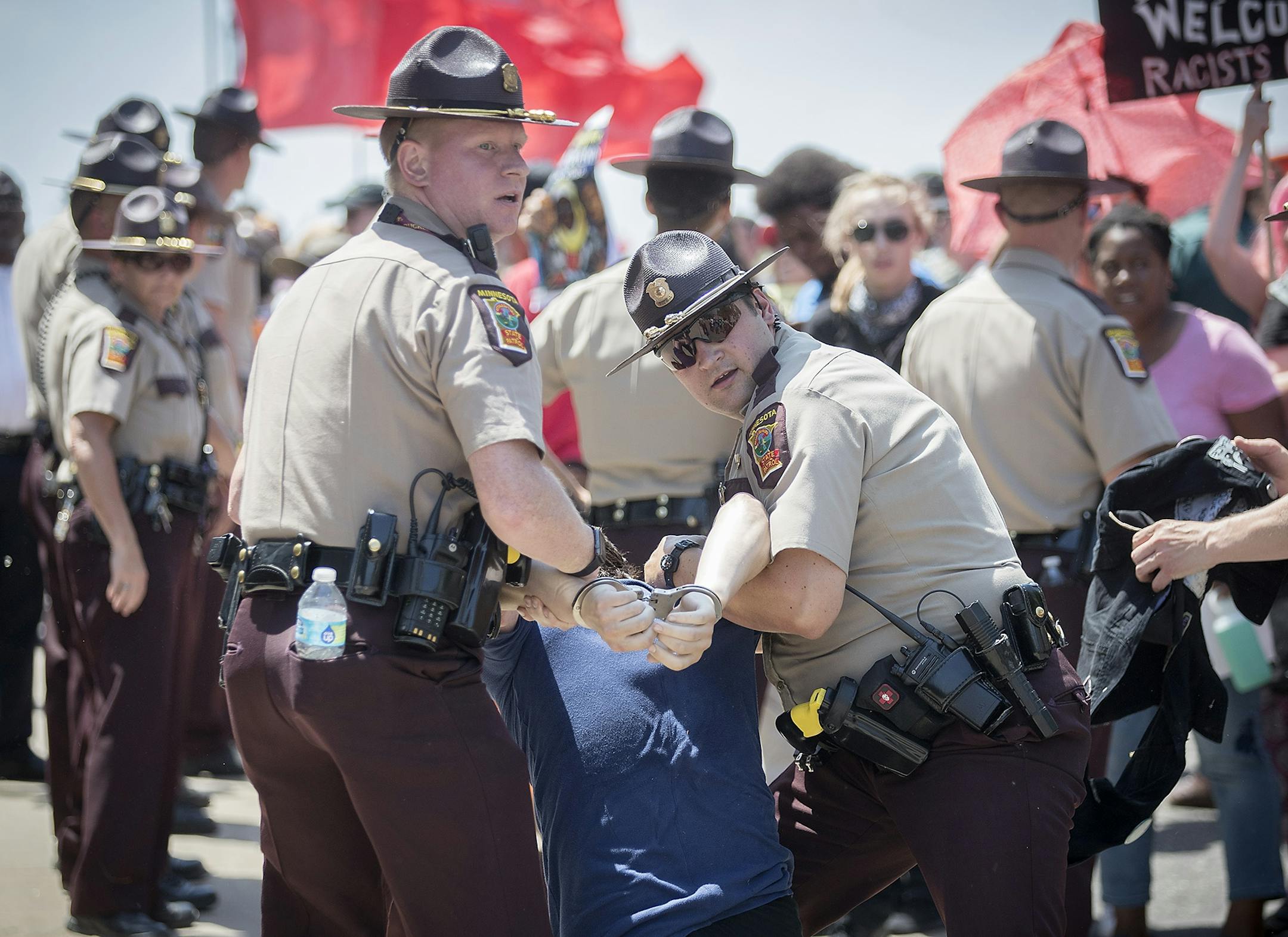 An anti-Sharia law group and antifascist protesters clashed during dueling rallies at the Minnesota State Capitol, Saturday, June 10, 2017 in St. Paul, MN. When a small faction of the anti-sharia group challenged the protesters outside, the Minnesota State Patrol had to intervene.