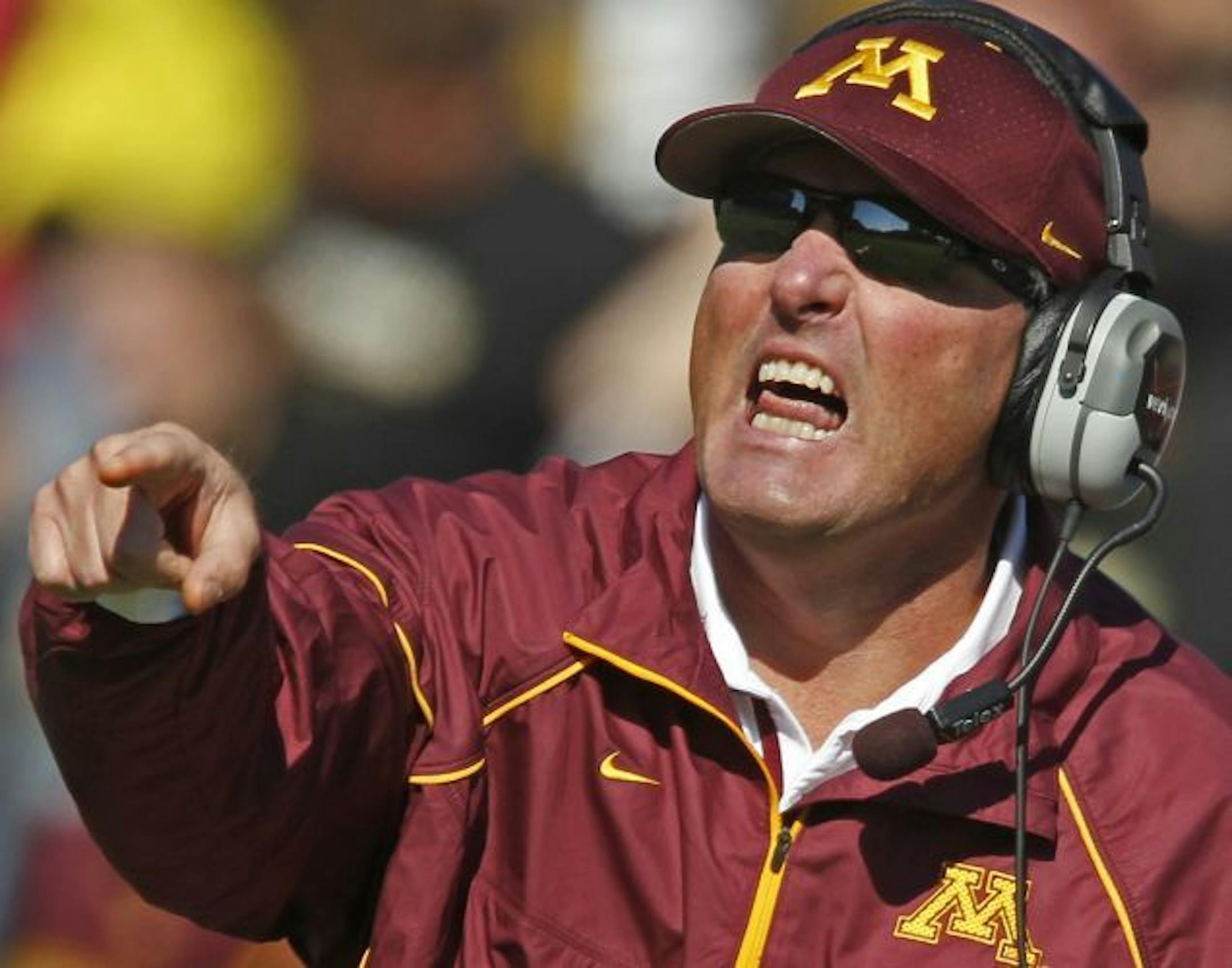 Former Gophers football coach Tim Brewster