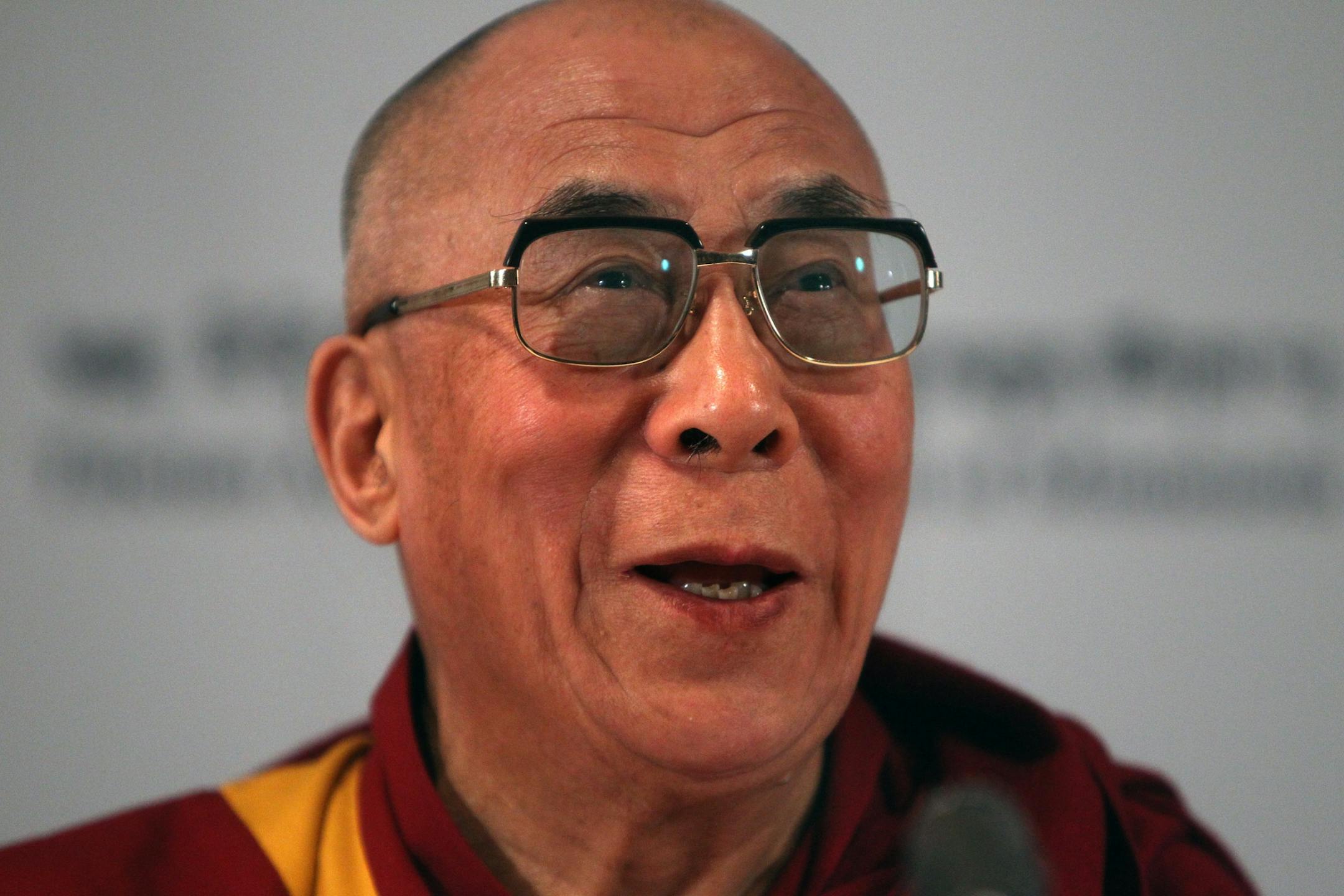 Buddhist holy leader the Dalai Lama appeared at a news conference at a downtown Minneapolis hotel Saturday morning.