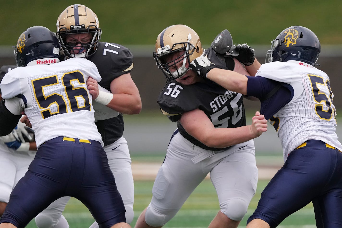 Chanhassen offensive lineman Peter Hiebert (56) blocks in the first quarter of a MSHSL Class 5A state quarterfinal game between Chanhassen and Mahtomedi Saturday, Nov. 11, 2023 at Apple Valley High School in Apple Valley, Minn. ] ANTHONY SOUFFLE • anthony.souffle@startribune.com