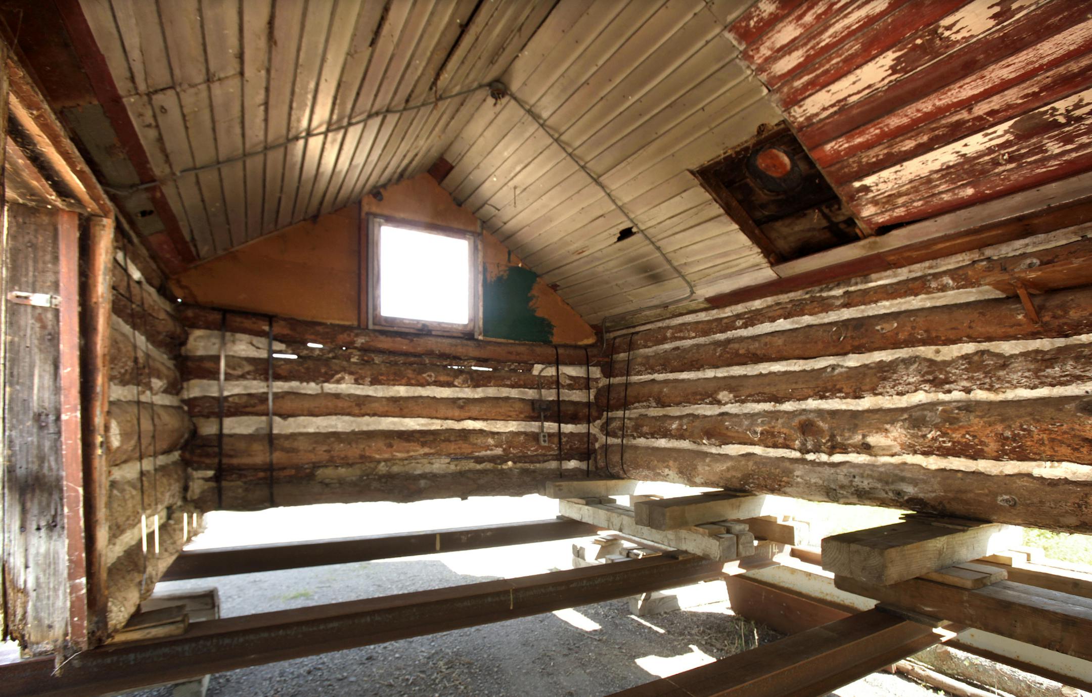 Irene Stemmer of Wayzata has saved its 19th century "Trapper's Cabin," moving the 1880s log building from its original site to restore the building and move it to a city park on August 7, 2013 in Wayzata, MN. ] JOELKOYAMA&#x201a;&#xc4;&#xa2;joel koyama@startribune Wayzata has saved its 19th century "Trapper's Cabin," moving the 1880s log building from its original site to restore the building and move it to a city park. The 12-by-15-foot cabin is thought to have been built in the 1880s when the