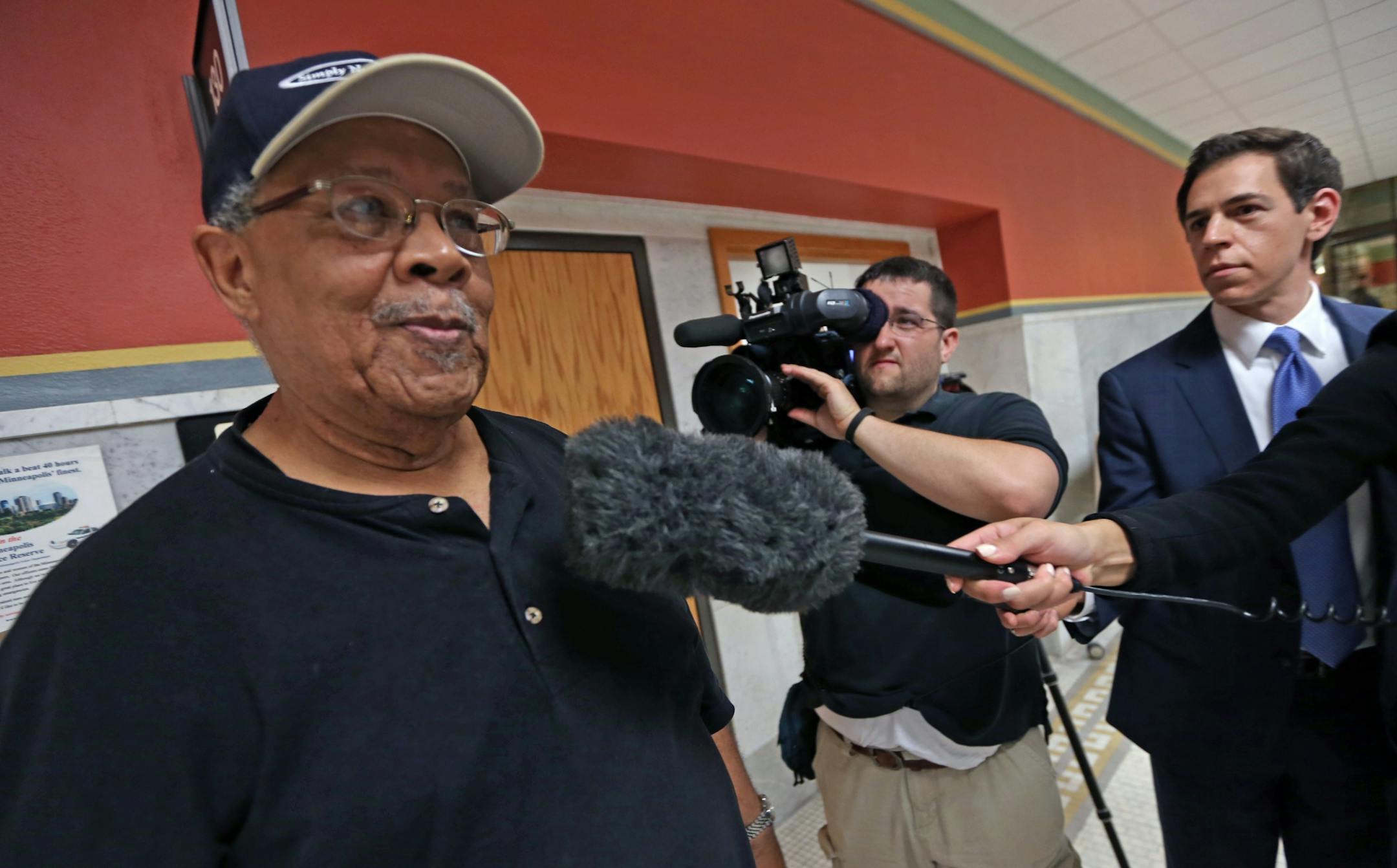 (left) Community Activist Ron Edwards talked to the media after he was denied entrance to a closed door meeting with community leaders on how to improve community relations with the police deptment, called by Minneapolis Police Chief Janee Harteau. This is in response to recent incidents in Green Bay involving Minneapoils cops. The meeting was held at Harteau's office in city hall on 8/7/13.