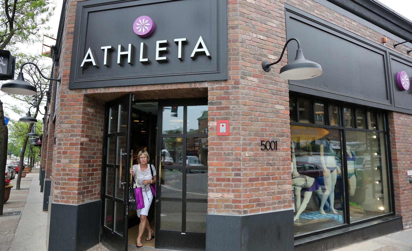 Barb Smith emerged from Athleta at 50th and France after making a purchase at the fitness apparel store, which is owned by Gap Inc.