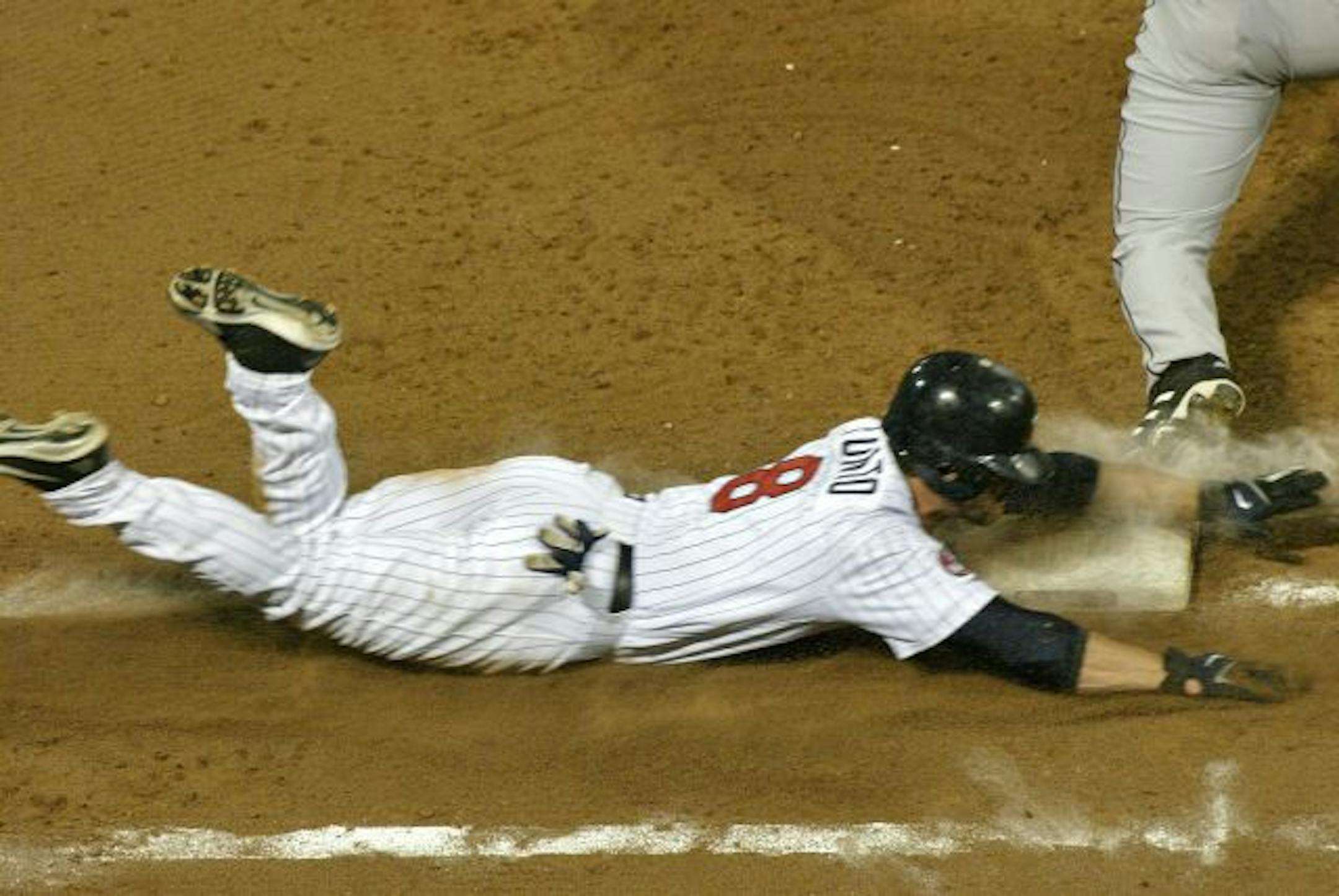 Nick Punto's face and arms and the first baseman's feet form a dangerous confluence when he dives to try to beat out a hit. Still, Punto says it's the fastest route to the bag.