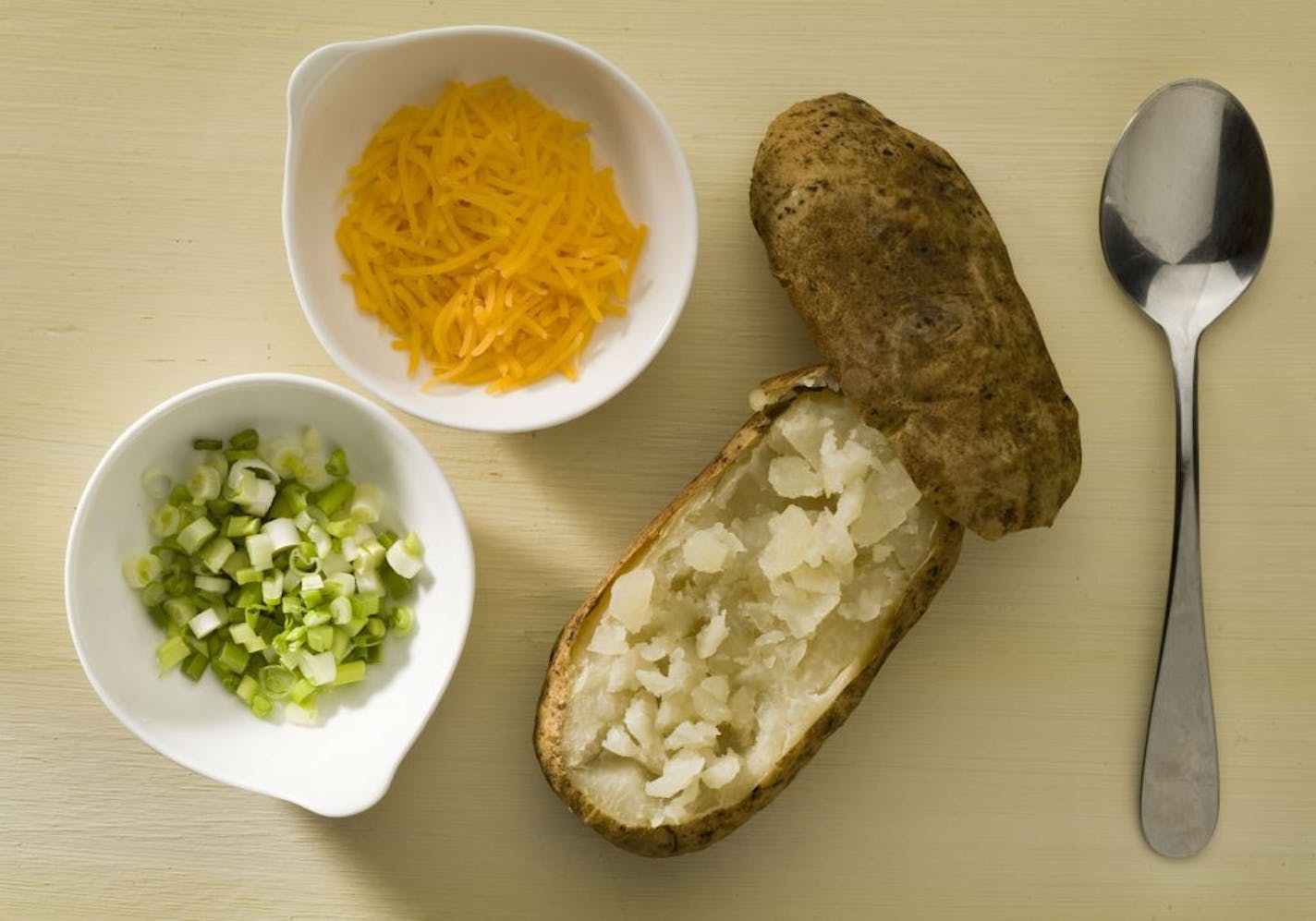 Some of the fixings you need to make stuffed potatoes.