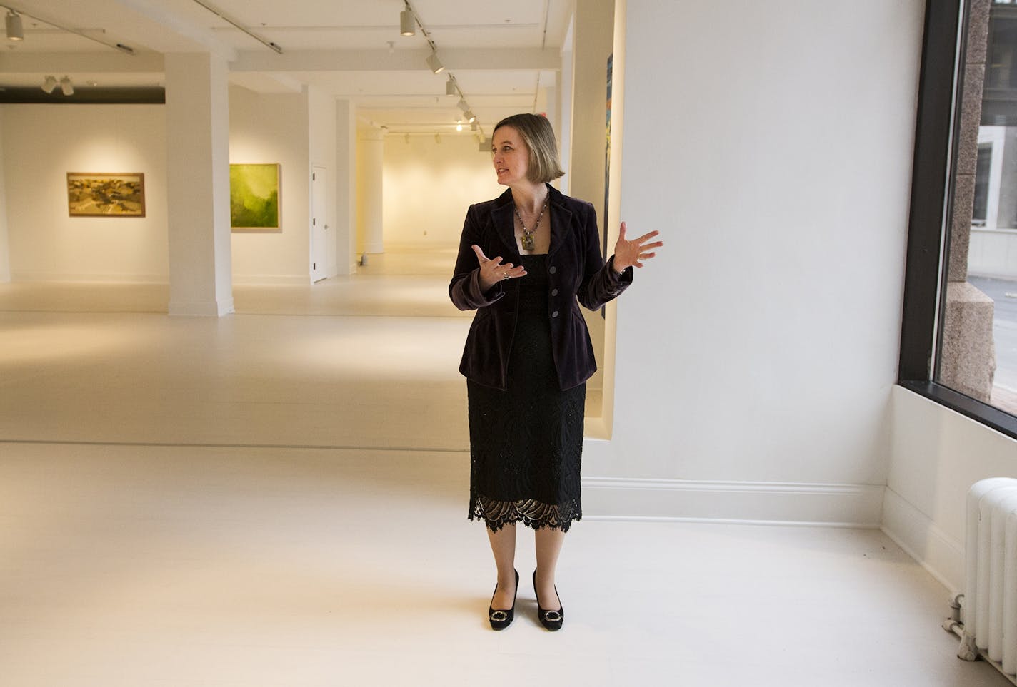 MMAA Executive Director Kristin Makholm stands in the museum's new gallery space on the first floor of the Pioneer Building in downtown St. Paul.