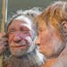 The March 20, 2009 file photo shows the prehistoric Neanderthal man "N", left, as he is visited for the first time by another reconstruction of a homo