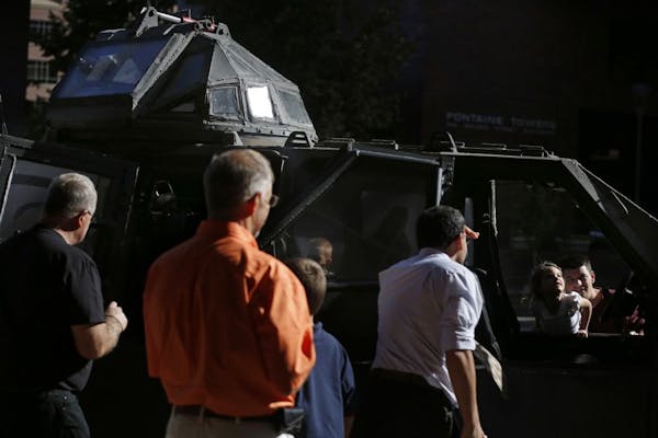 At the downtown Rochester library, adults and children alike checked out the Tornado Intercept Vehicle, or TIV, which is being used to promote the fil