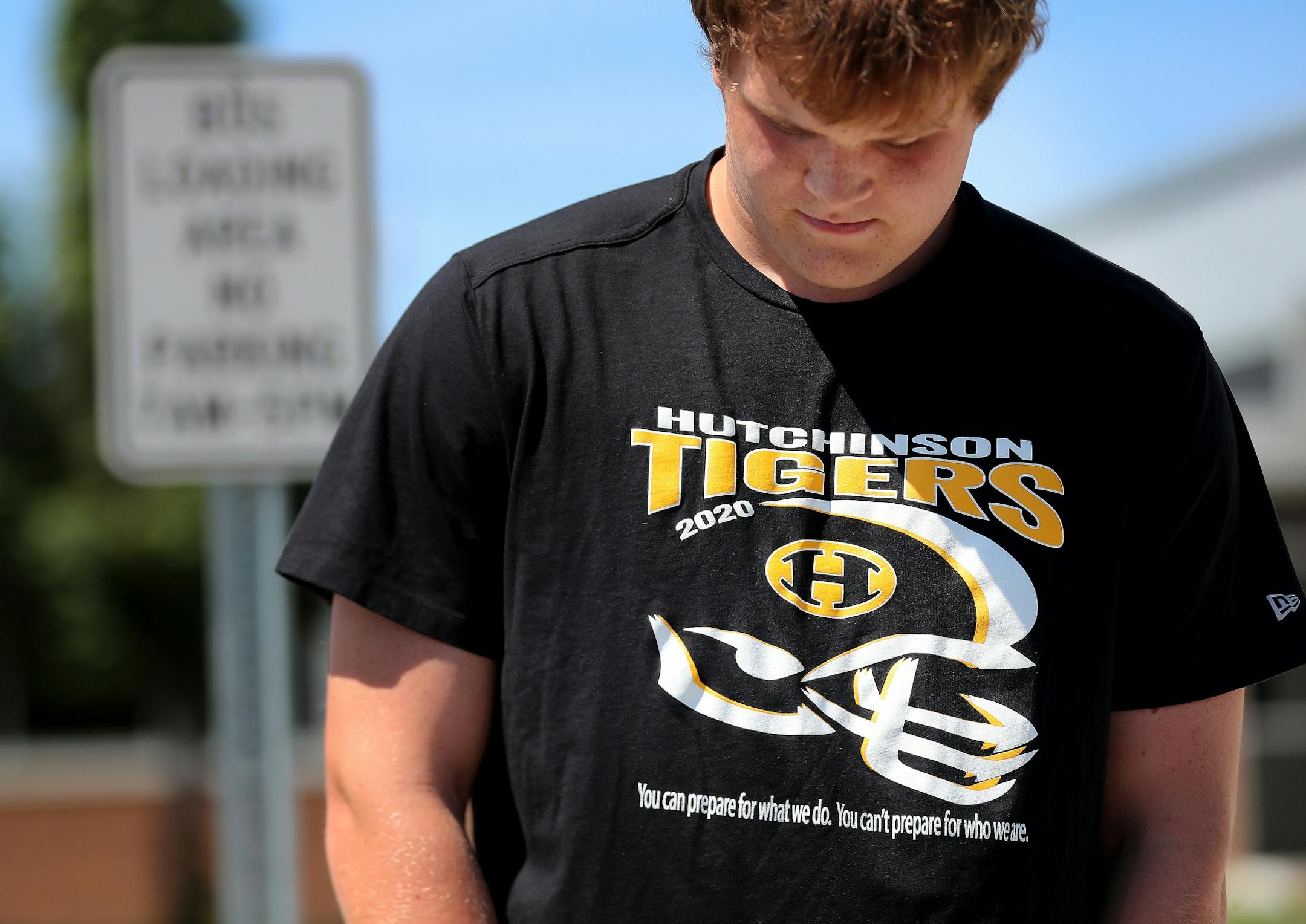Hutchinson High School football players Tristan Hoppe reacted after hearing the MSHSL voted to postpone the upcoming football season until spring Tuesday, at Hutchinson High in Hutchinson.