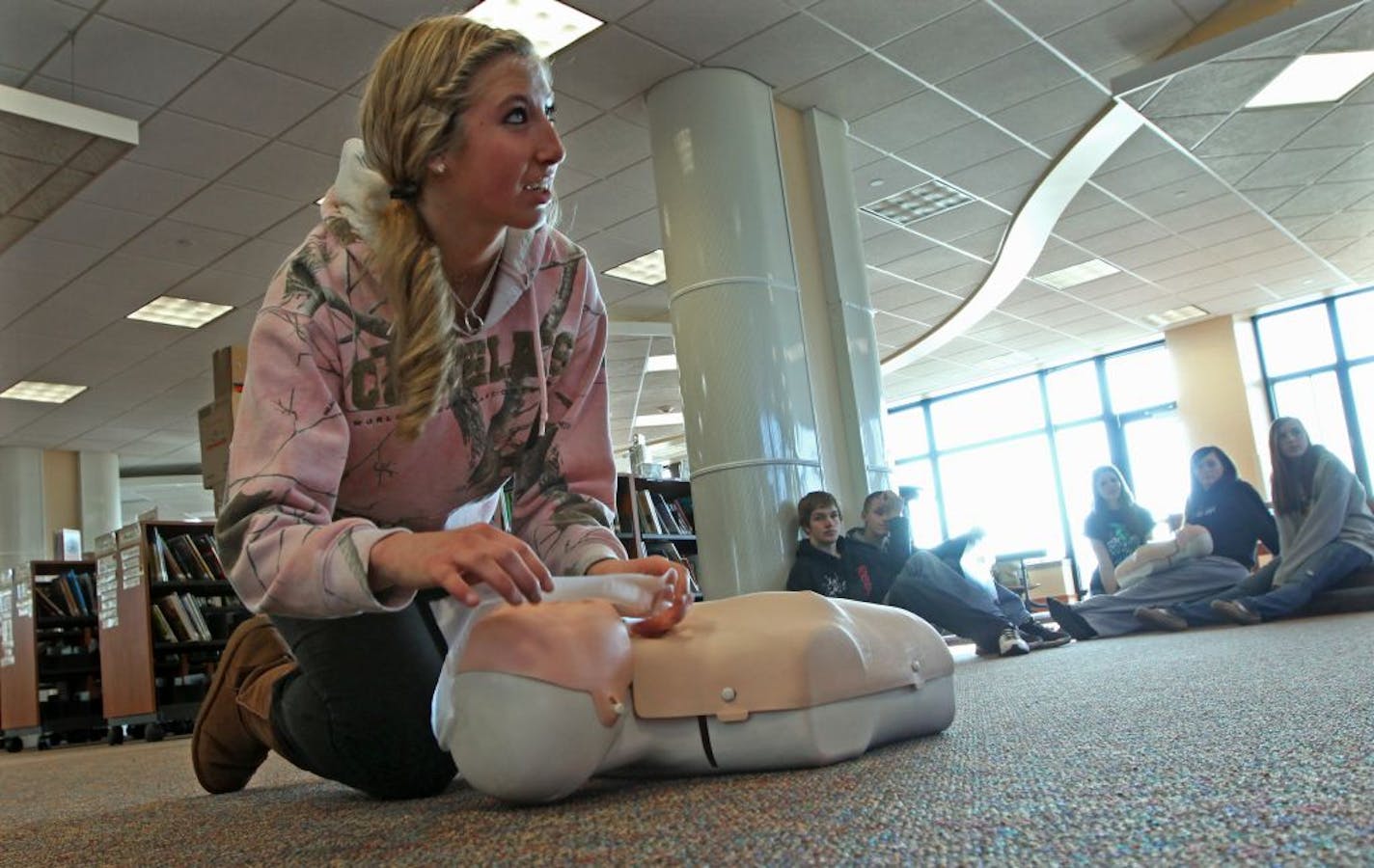 Rogers High School student Brittney Dorn joined other 10th graders from Elk River, Rogers and Zimmerman schools who took part in a CPR class, as part of a half-day leadership training session. The classes were taught at Twin Lakes Elementary School in Elk River. A new program requires leadership training for all school activity presidents and captains of athletic teams in the district.