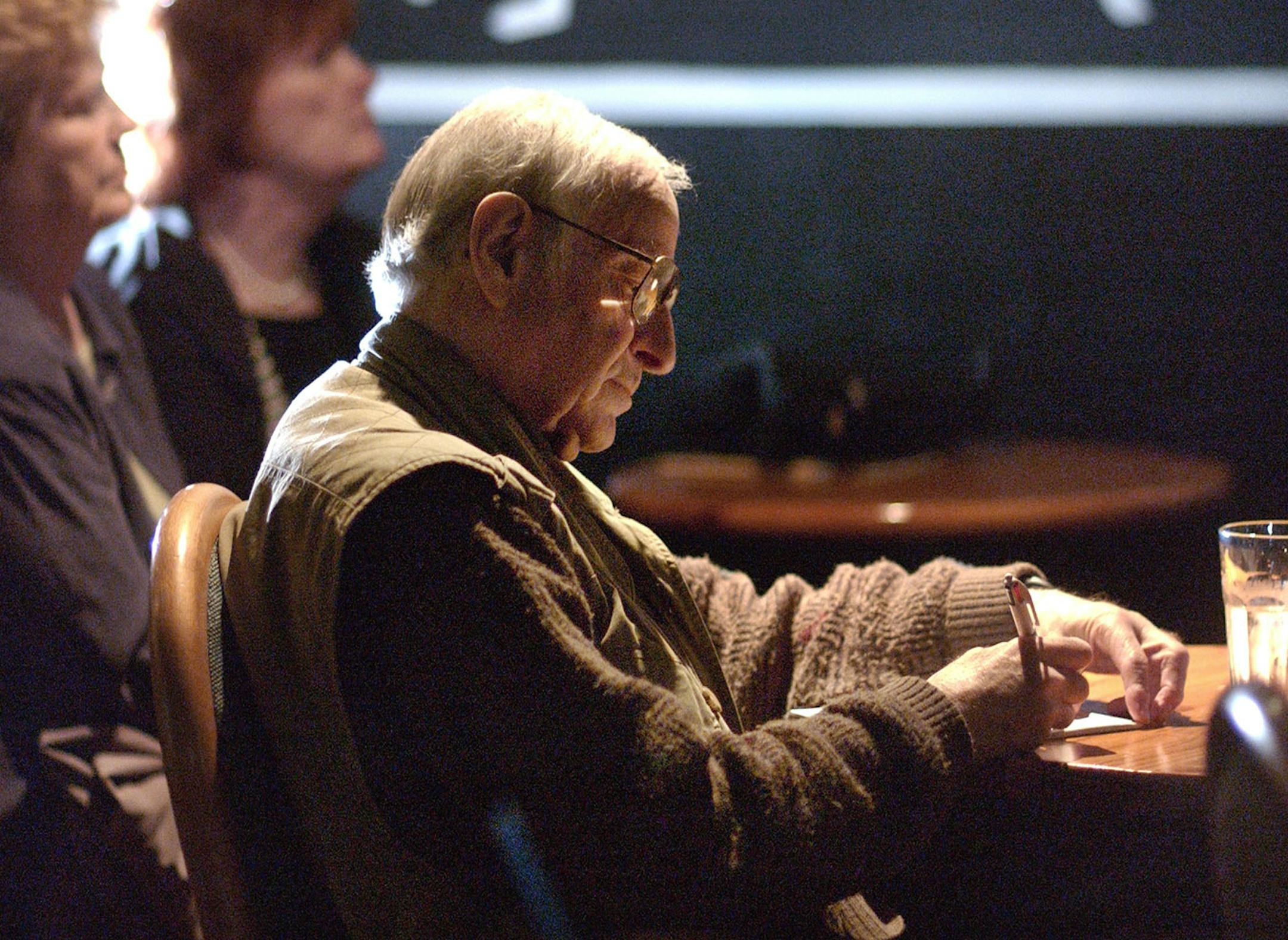 SUNDAY_05/05/02_Minneapolis - - - - - - Leigh Kamman jotted down some notes while listening to a jazz set at the artists Quarter in downtown St.Paul.