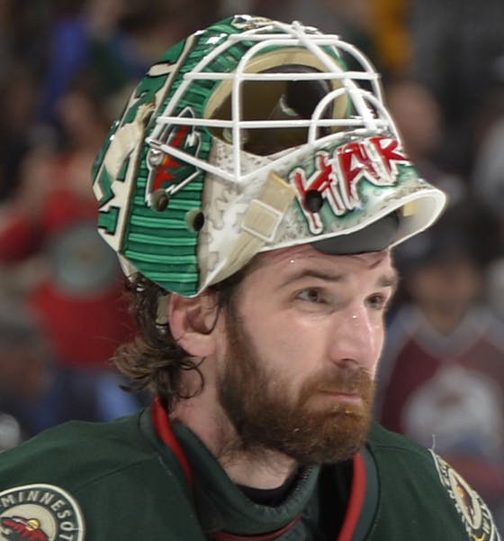 Minnesota Wild goalie Josh Harding (37) looks on against the against the Colorado Avalanche during the third period of an NHL hockey game Saturday, No