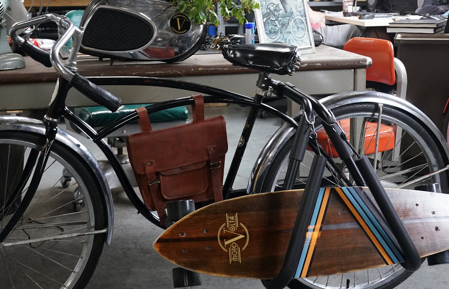 The Skatebike features a rack to carry a motorized skateboard. 
