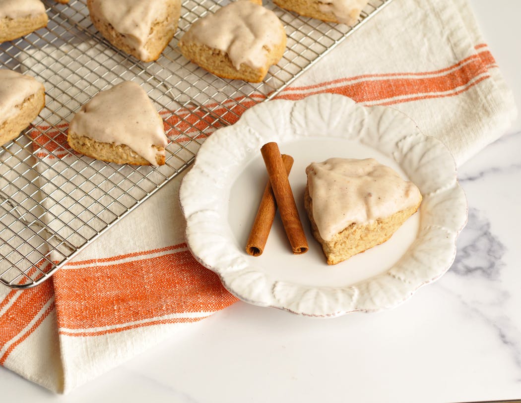 Glazed Chai-Spiced Cream Scones have warming fall flavors. 