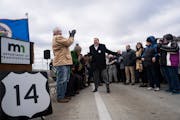 President of the Highway 14 Partnership Kevin Raney got a friendly greeting from Gov. Tim Walz at the opening ceremony Tuesday for the Hwy. 14 expansi