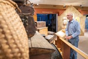 Joseph Sobota looks at artifacts Wednesday, Dec. 28, 2022 inside Carver County Historical Society in Waconia, Minn. ] ALEX KORMANN • alex.kormann@st