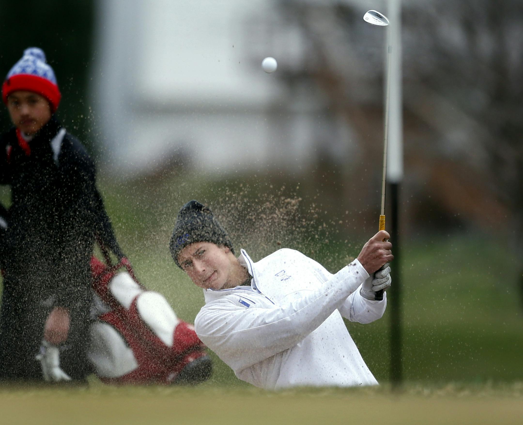 Grant Raja of Wayzata shoots out of a sand trap while playing in the Tri-State invitational at Edinburgh USA Golf course April 24, 2015 in Brooklyn Park, Minnesota.] Jerry Holt/ Jerry.Holt@Startribune.com