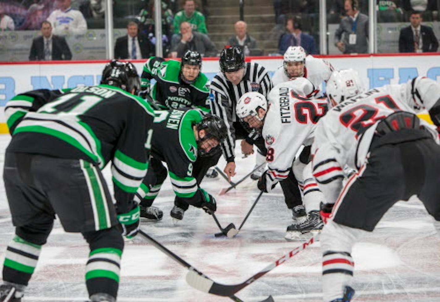 North Dakota Fighting Hawks forward Dixon Bowen (9) and St. Cloud State Huskies forward Kevin Fitzgerald (28) face off in game one of the NCHC Frozen Faceoff.  [ Special to Star Tribune, photo by Matt Blewett, Matte B Photography, matt@mattebphoto.com, St. Cloud State Huskies, University of North Dakota, NCHC Frozen Faceoff, Xcel Energy Center, March 16, 2018, Minnesota, SAXO 1005722774 NCHC031718