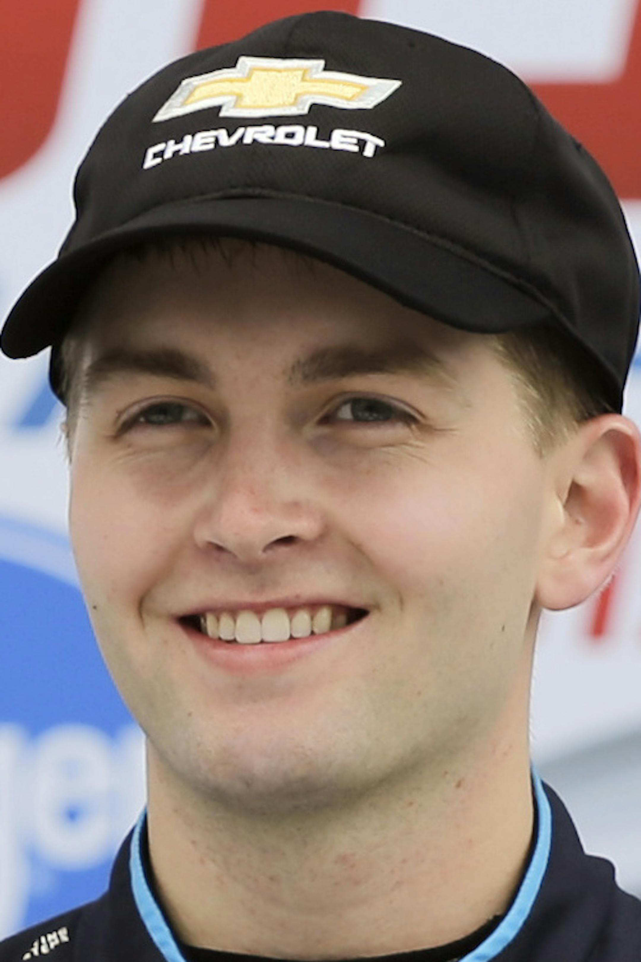 Front row driver Alex Bowman, left, and pole-sitter William Byron hold their trophies after qualifying for the Daytona 500 auto race at Daytona International Speedway, Sunday, Feb. 10, 2019, in Daytona Beach, Fla. (AP Photo/Terry Renna)