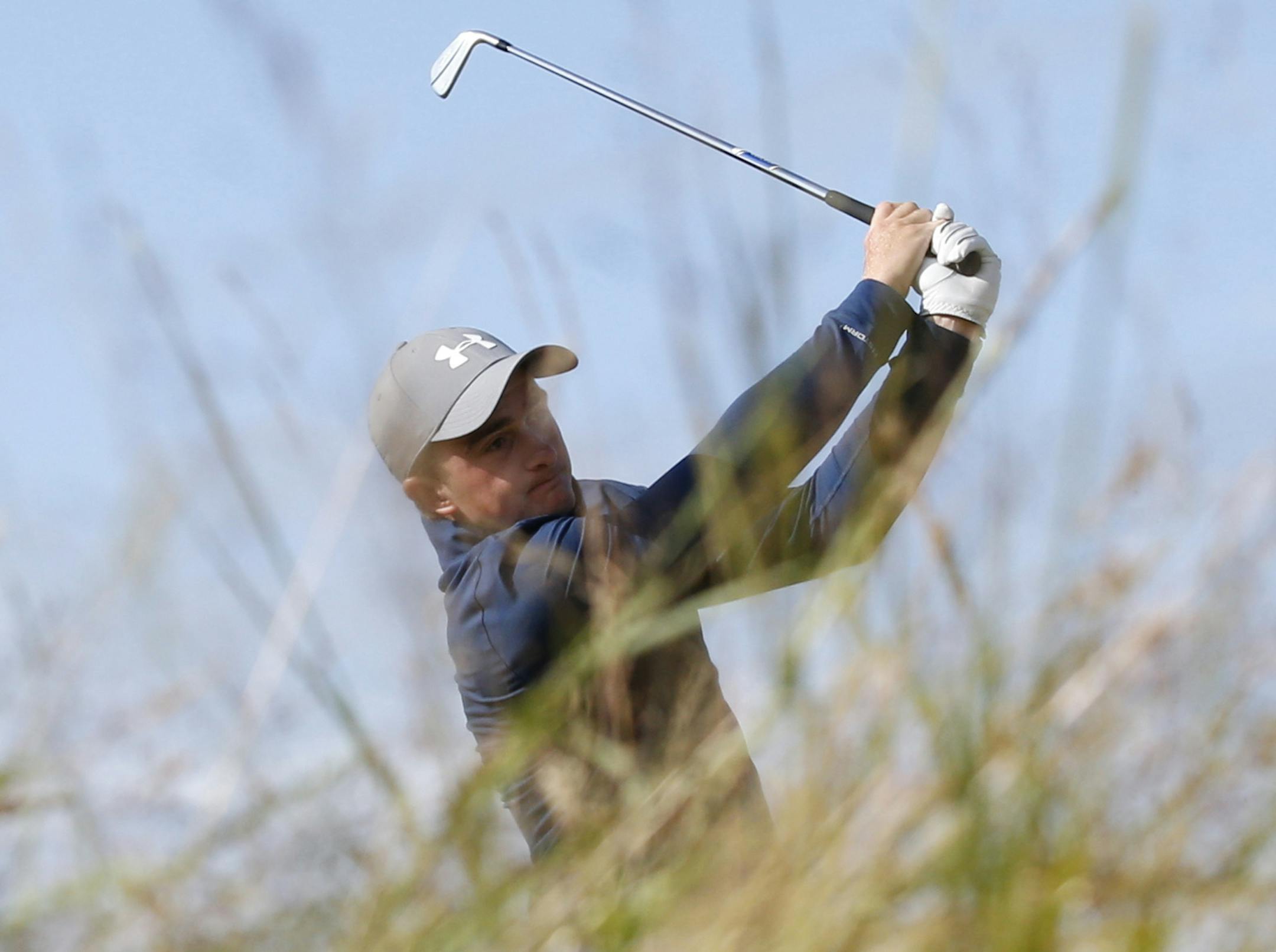 Ireland’s Paul Dunne drives on the 16th tee during the third round of the British Open Golf Championship at the Old Course, St. Andrews, Scotland, Sunday, July 19, 2015. (AP Photo/Jon Super)