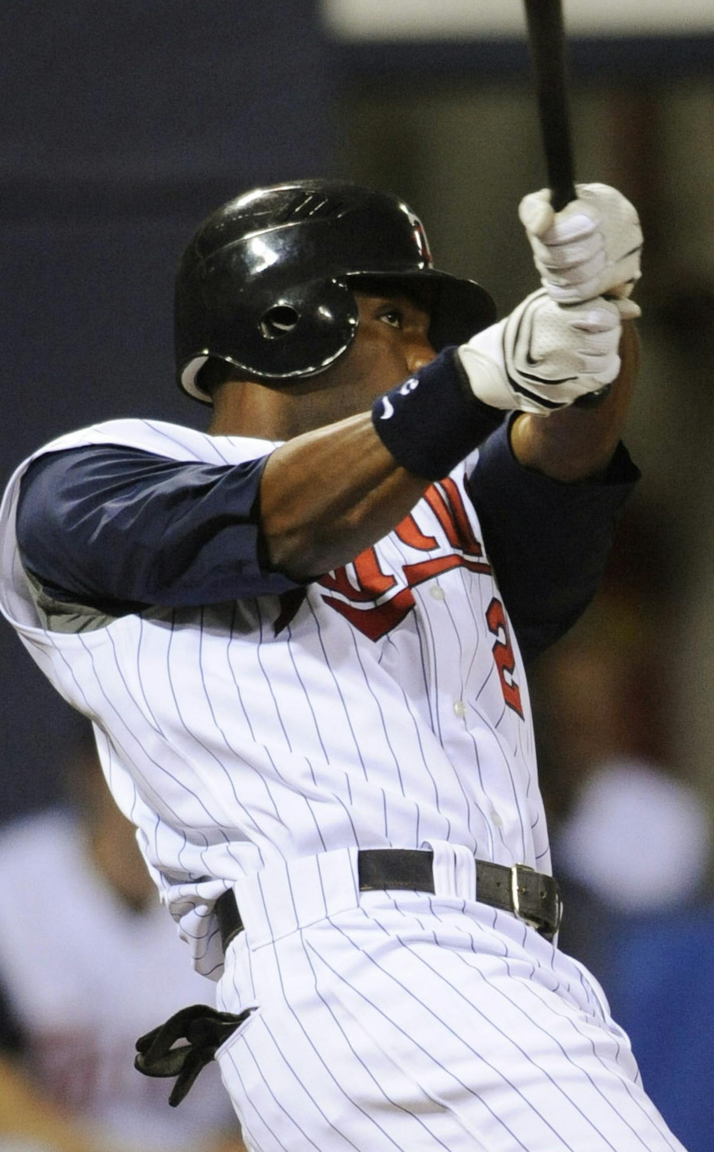 Minnesota Twins' Denard Span hits a solo home run against the Cleveland Indians in the eighth inning of a baseball game on Sunday, Aug. 3, 2008 in Minneapolis. Twins won 6-2. (AP Photo/Hannah Foslien) ORG XMIT: MNHF109