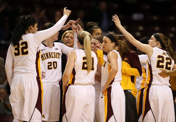 The Gophers gathered for a timeout moments after they pulled ahead of Green Bay on Rachel Banham's three pointer Wednesday night. ] JEFF WHEELER ‚Ä