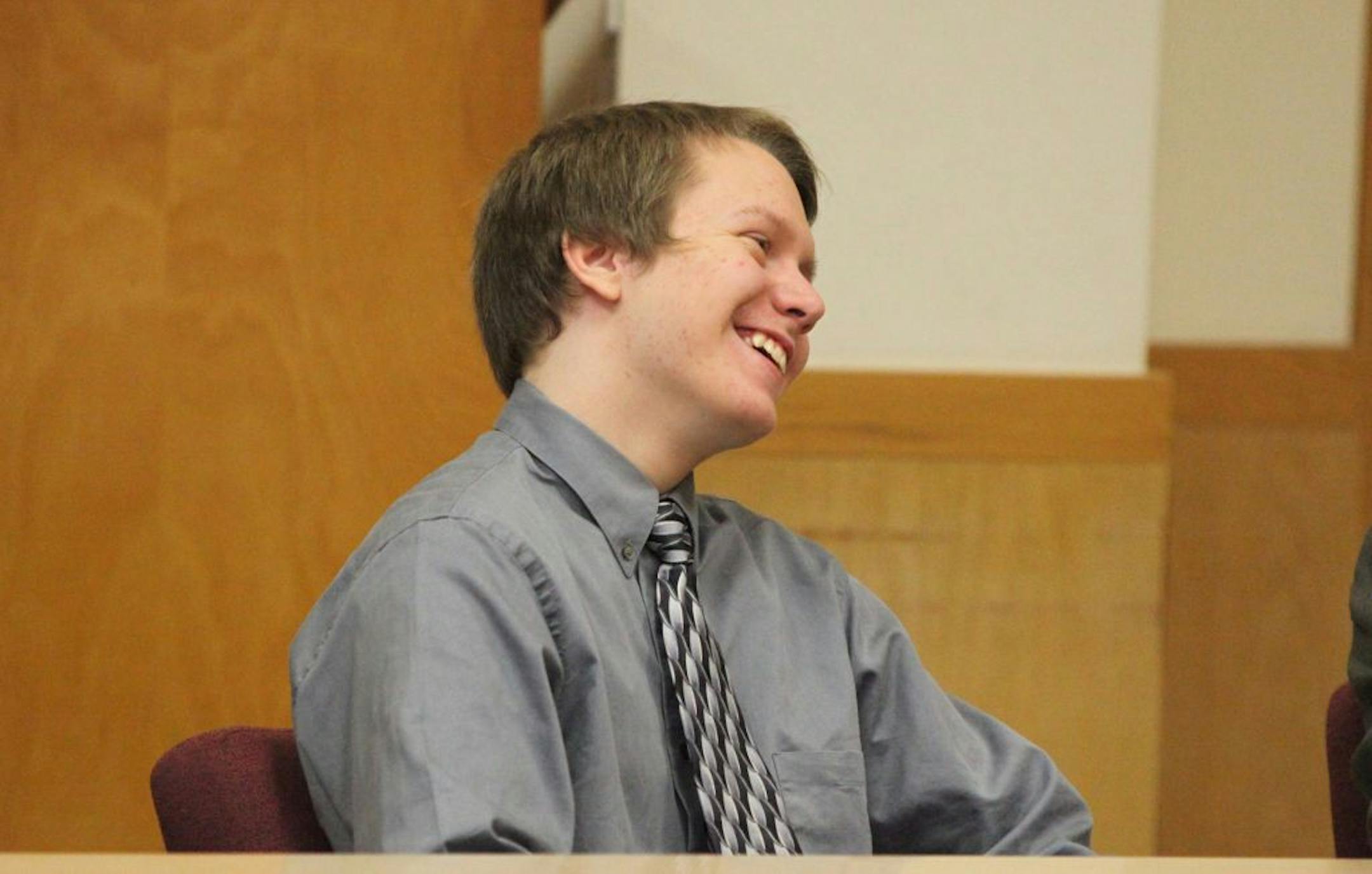 Michael Swanson smiles as the judge reads his guilty verdict for both murder and robbery in the first degree at the Carroll County Court House in Carroll, Iowa, Thursday, June 23, 2011. The Carroll County jury has found Swanson guilty of first-degree murder in the shooting death of a northern Iowa convenience store clerk last fall.