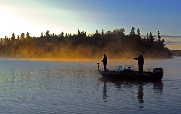 At sunrise or sunset, Lake of the Woods is a magnet for anglers