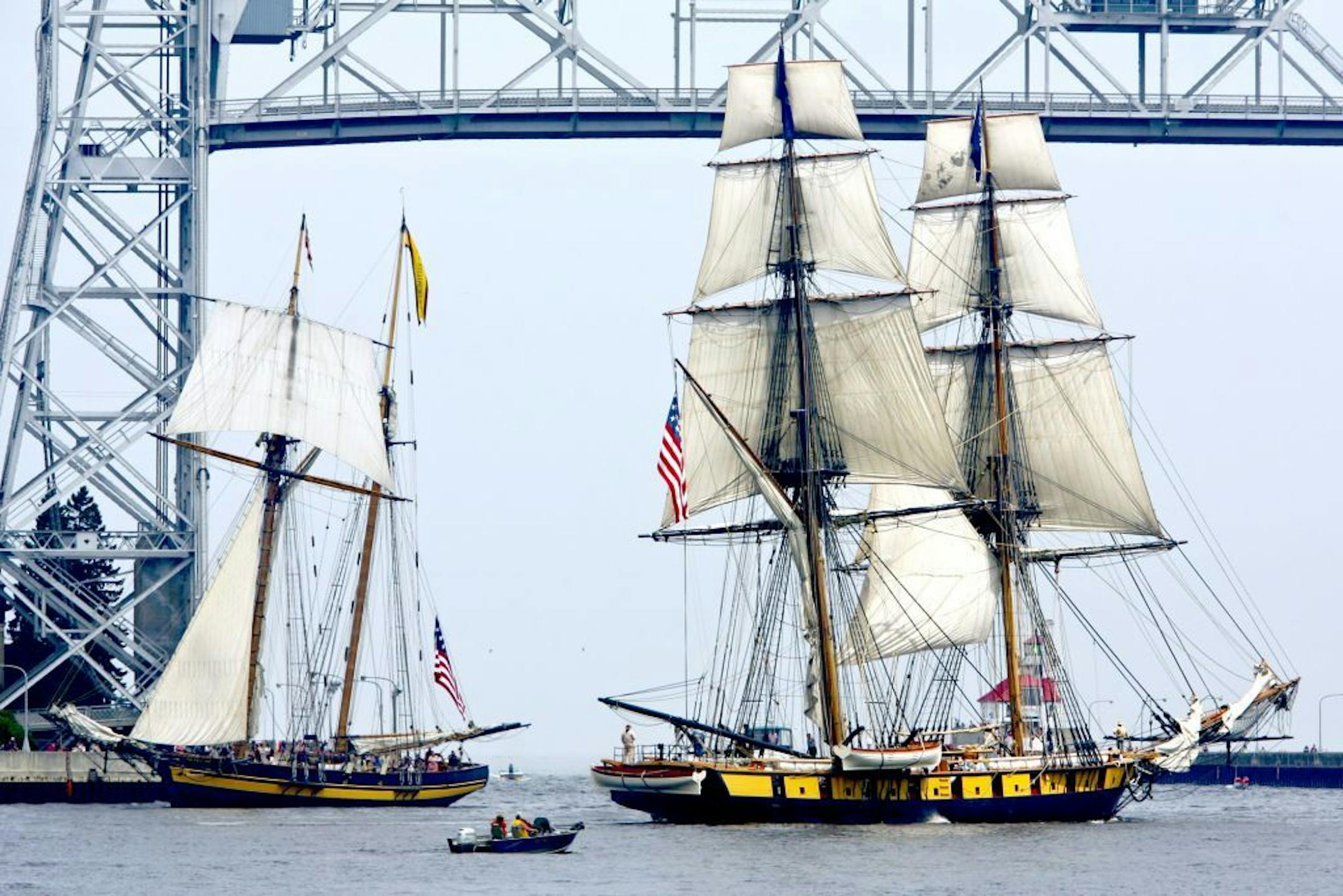 July 16, 2011: The Pride of Balitmore II and the U.S. Brig Niagara pass each other near the Aerial Lift Bridge in the Duluth, MInn., harbor.