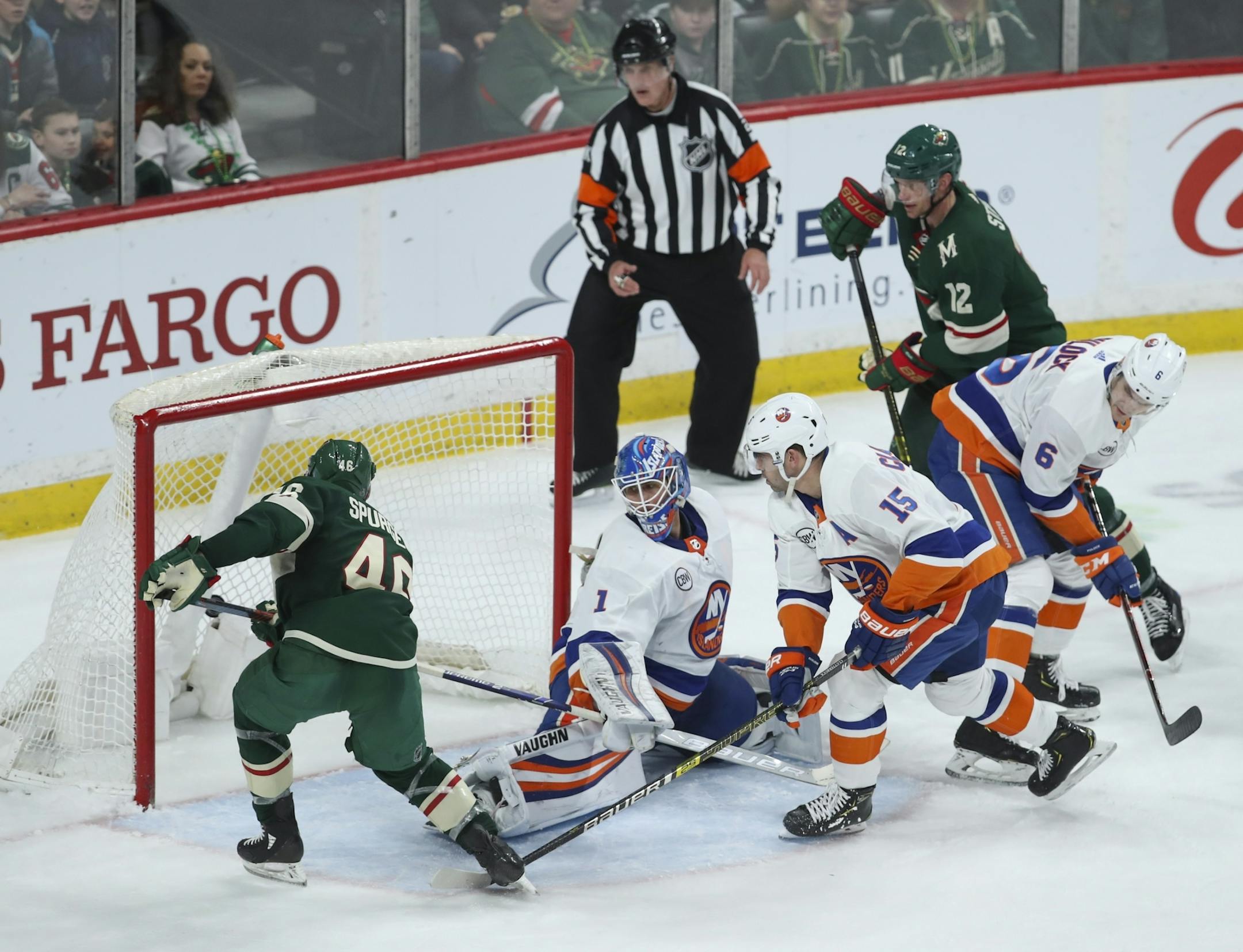 Minnesota Wild defenseman Jared Spurgeon (46) tied the game at 2-2 in the third period when he buried the rebound of a puck shot by teammate Eric Staal (12) on an out of position New York Islanders goaltender Thomas Greiss.