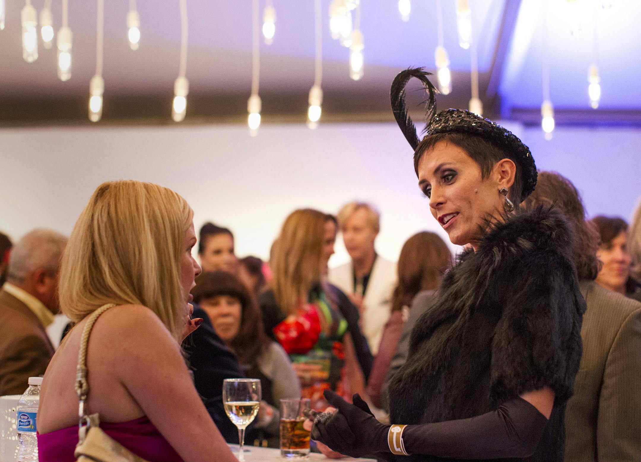 Sandy Simmons, right, talks with a friend at Avant Garden at the Walker Art Center September 21, 2013. (Courtney Perry/Special to the Star Tribune)