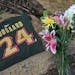 Hockey fans left a Derek Boogaard t-shirt and bundles of flowers outside of the Xcel Energy Center shortly after his death in 2011.