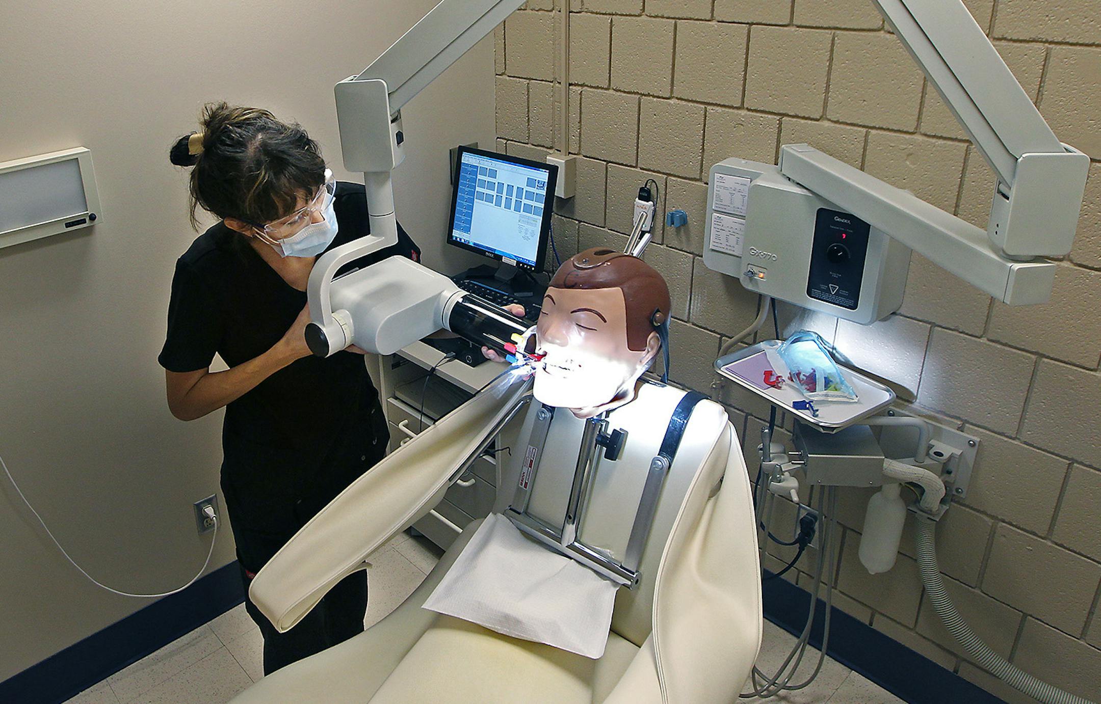 Normandale Community College dental hygienist student Tatiana Calatayud, cq, worked on her x-ray skills on a mannequin during clinic hours, Thursday, September 17, 2015 in Bloomington, MN. ] (ELIZABETH FLORES/STAR TRIBUNE) ELIZABETH FLORES • eflores@startribune.com