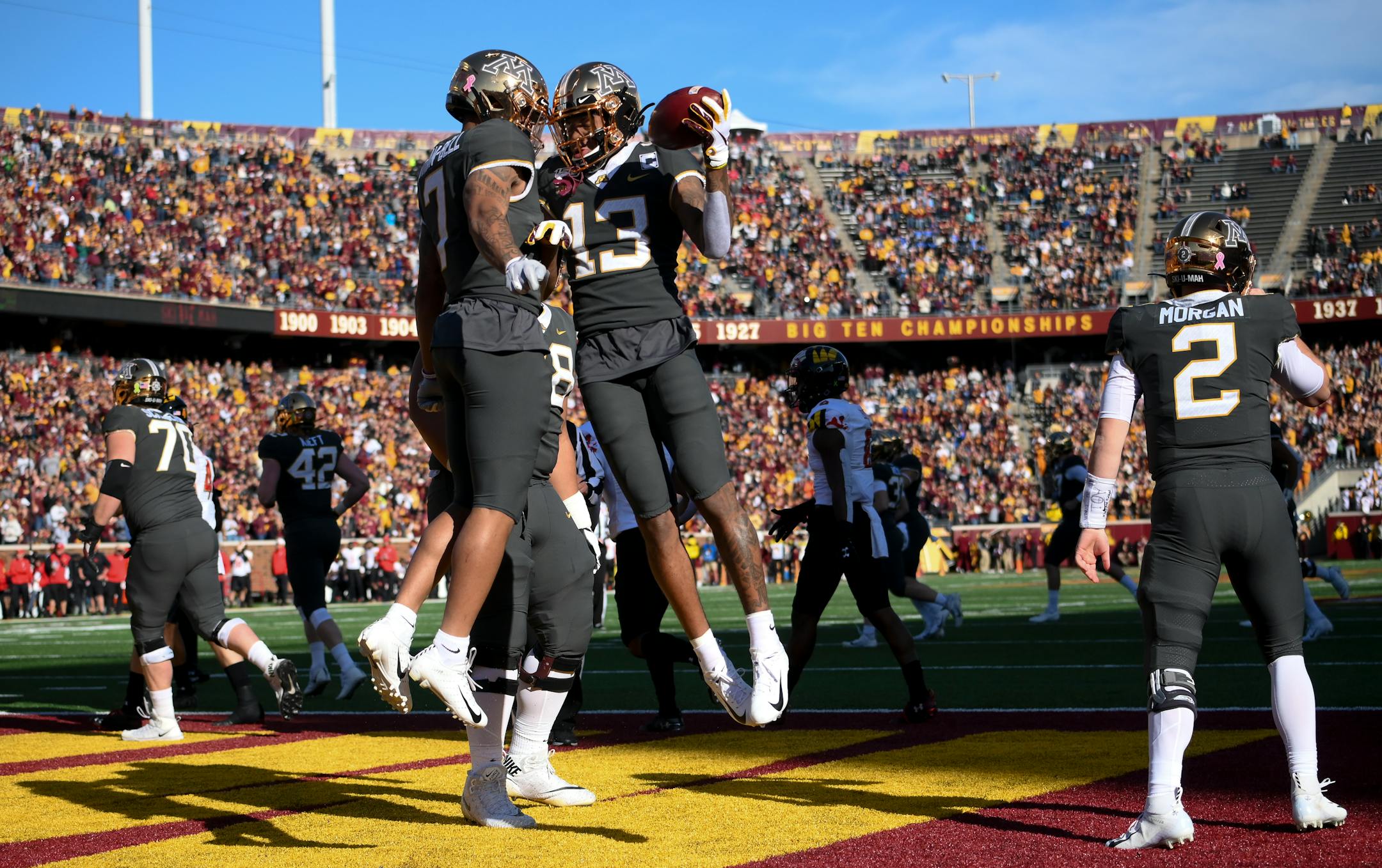 Gophers wide receiver Chris Autman-Bell (7) and wide receiver Rashod Bateman (13) celebrated Bateman's first-quarter touchdown against Maryland. Up next: Unbeaten Penn State at TCF Bank Stadium on Saturday.