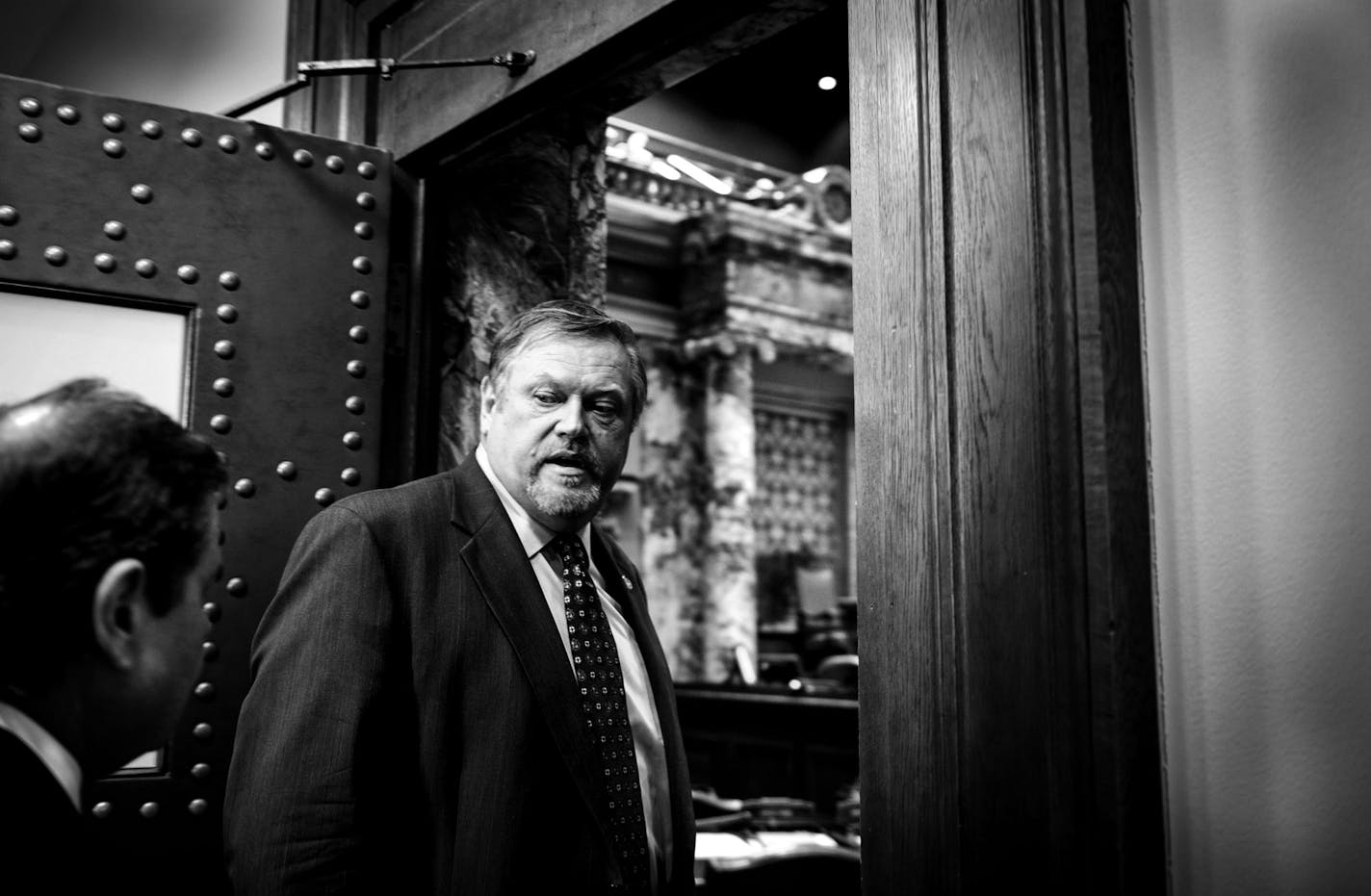 Senate Majority Leader Tom Bakk talked quickly with his chief of staff Tom Kukielka before entering the Senate floor and starting the day's session. ] GLEN STUBBE * gstubbe@startribune.com Monday, March 31, 2014.