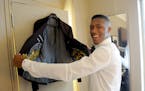 Top NBA pick Kris Dunn gets ready for the draft, wearing JF J. Ferrar only at JCPenney, Thursday, June 23, 2016, in New York. The liner was custom-mad