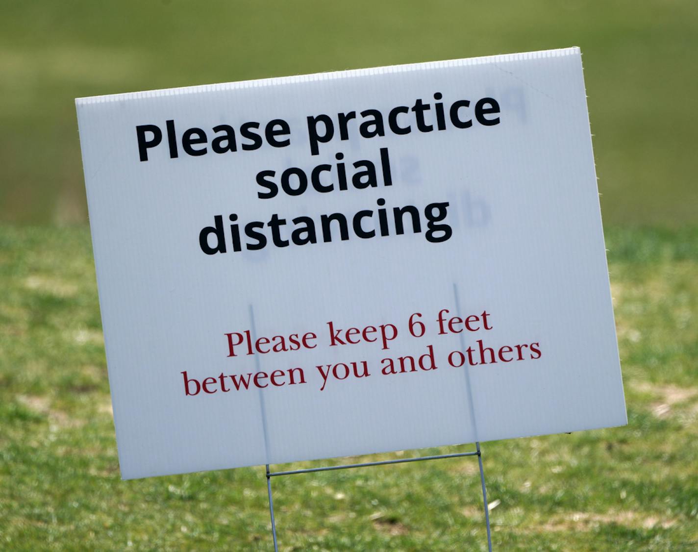 Golfers at Stonebrooke Golf Club in Shakopee were practicing social distancing April 24.