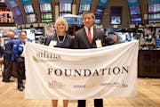 Jack Alexander and his business teacher Candace Lee at the New York Stock Exchange.
Photo: SIFMA