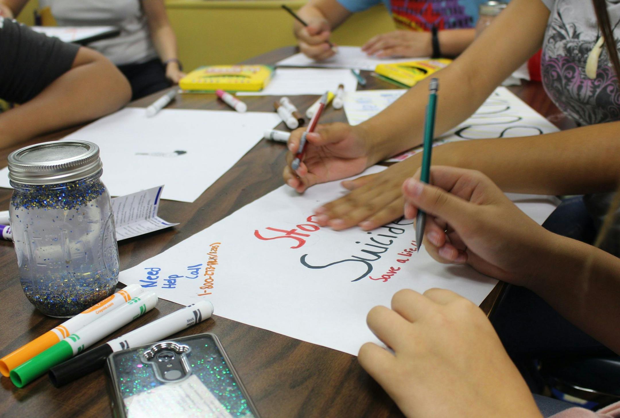 Peer-to-peer prevention programs like Keep the Fire Alive in Minneapolis teach teens the importance of talking openly with their friends about how they are feeling.