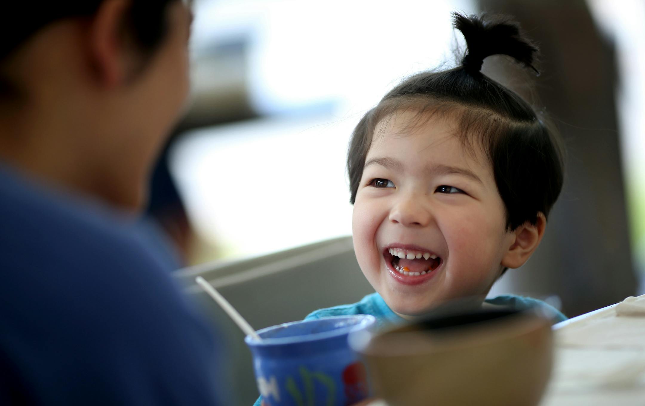 Anthony Plotz, 3,enjoyed soup in a handmade bowl at the Empty Bowls NE, fundraiser Sunday in Minneapolis. His parents, Jon and Katrina Plotz, dined with him.