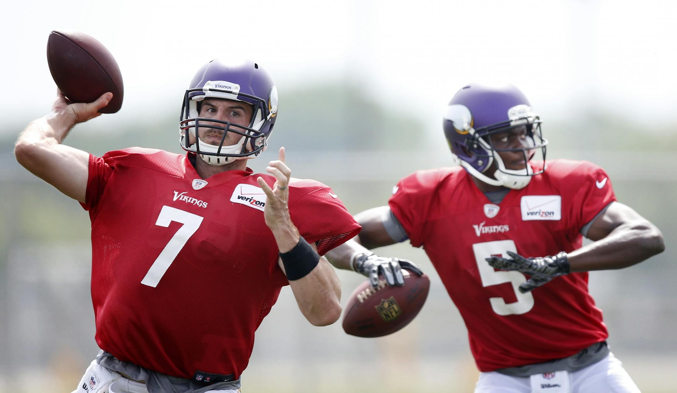 Minnesota Vikings quarterbacks Christian Ponder (7) and Teddy Bridgewater (5) during the afternoon practice on Tuesday.