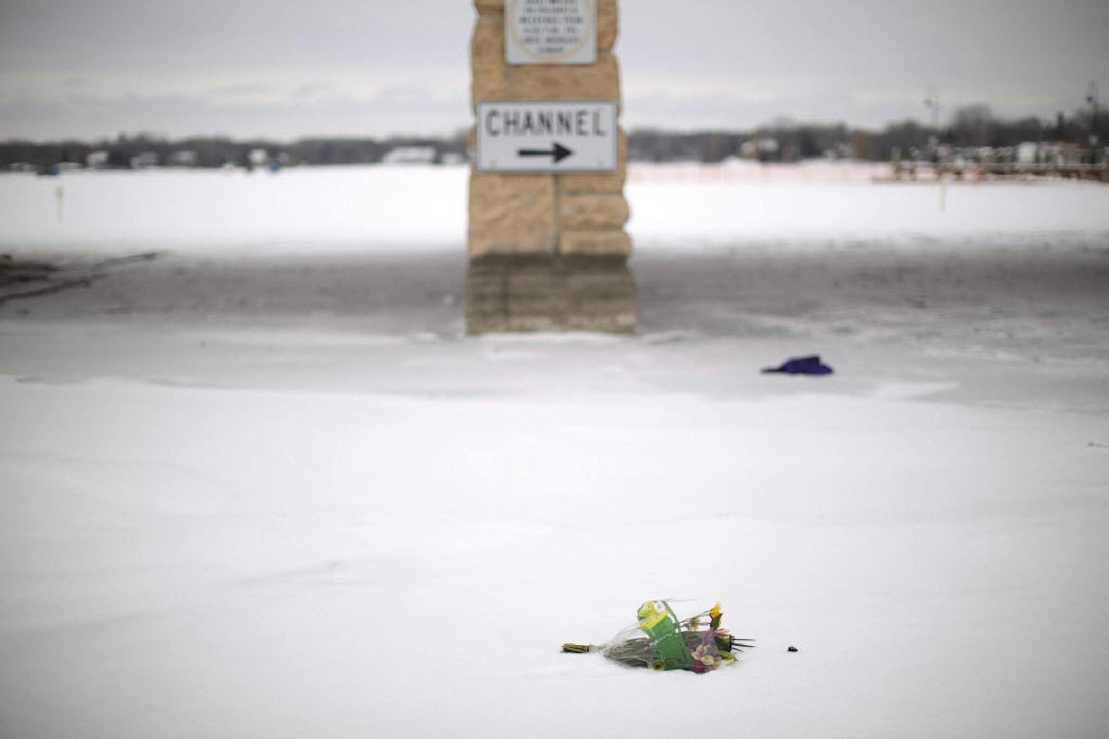 A bouquet rested a few yards from the scene of Saturday's accident between Wayzata Bay and Gray's Bay on Lake Minnetonka.