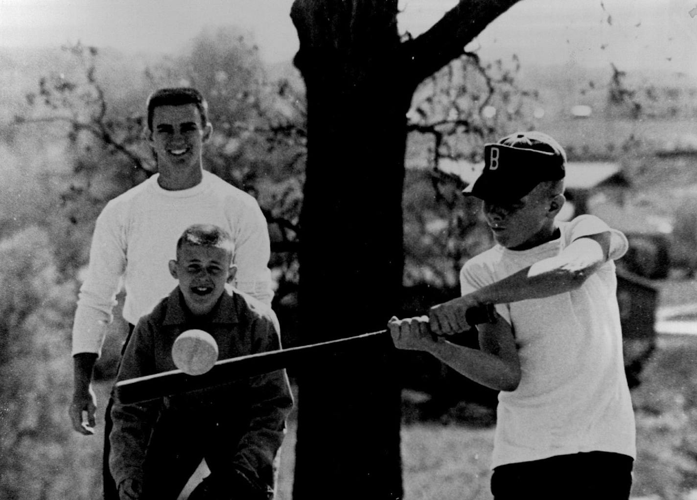 May 11, 1957 Roger Cook, 11, 1408 Sumter avenue N., Golden Valley, takes a lusty swing at a pitch in a YMCA Gra-Y softball game at Noble Avenue school. Catcher is Terry Berg, 11, 3039 Lee avenue, Golden Valley. John Teresi, 3731 Upton avenue N., is the umpire and group leader. Through a Community Chest priority allocation, the YMCA expanded its youth program to Robbinsdale and Golden Valley this year. May 10, 1957 Minneapolis Star Tribune