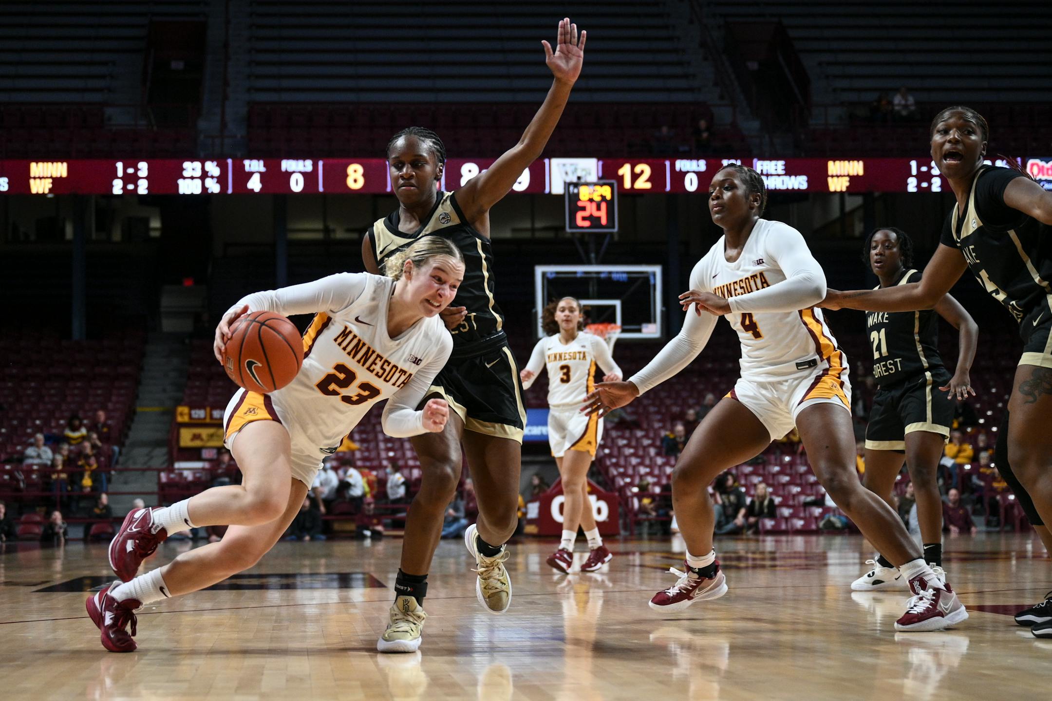 Minnesota Gophers guard Katie Borowicz (23) charges toward the basket against Wake Forest guard Raegyn Conley (11) during the first half of an NCAA women's basketball game Wednesday, Nov. 30, 2022 at Williams Arena in Minneapolis, Minn.