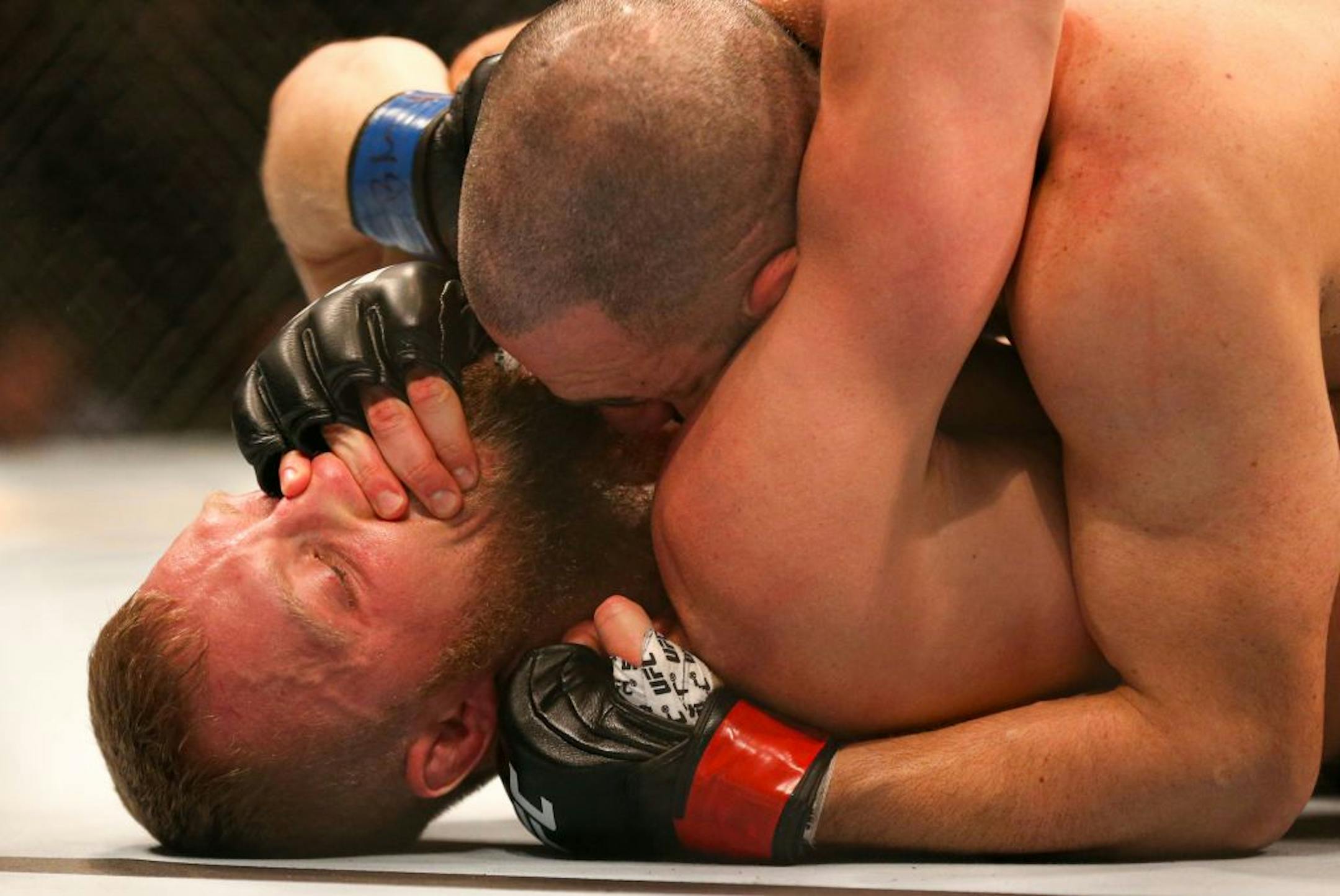 Dan Moret is subdued by Jared Gordon on the floor. Gordon would go on to win the match by unanimous decision. ALEX KORMANN ¥ alex.kormann@startribune.com UFC Fight Night was held at Target Center on Saturday June 29, 2019. Francis Ngannou and Junior Dos Santos headlined the event.