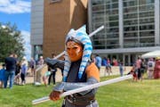 An Ahsoka Tano cosplayer volunteers at the Science Museum of Minnesota. The St. Paul museum hosts Star Wars Day every year.